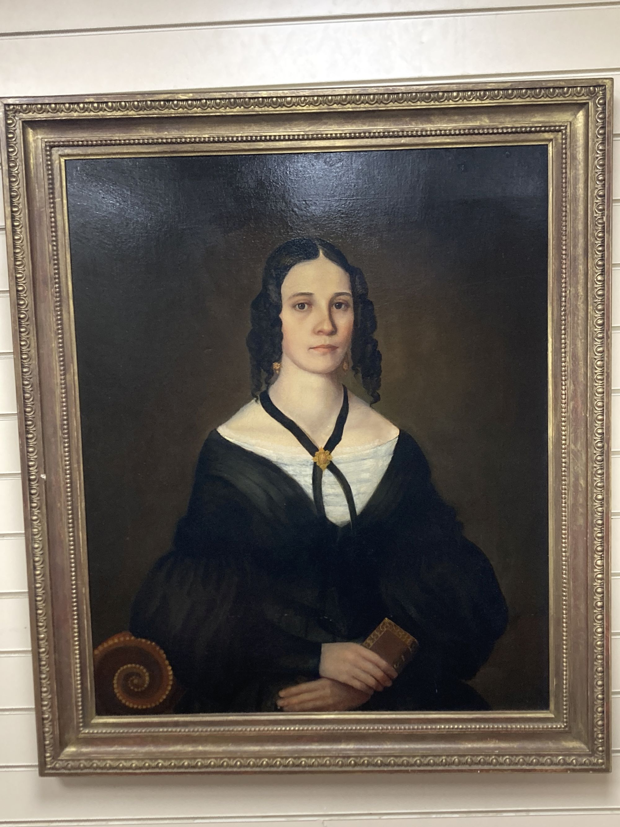 English School c.1840, oil on canvas, Half length portrait of a young lady, 90 x 75cm